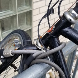 make sure you thread your cable lock around bike frame, tire and rack to secure