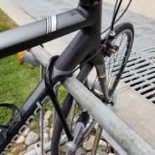 the best security is a high-quality u-shaped lock through the bike frame, wheel and bike rack